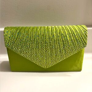 Neon green evening clutch bag with embellishments